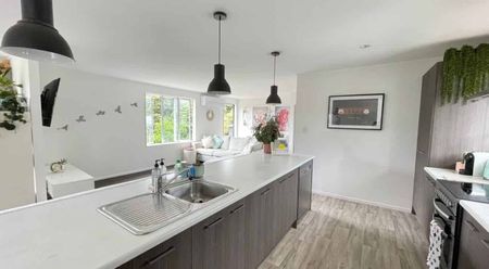 Coastal Charm Meets Family Comfort - Photo 3