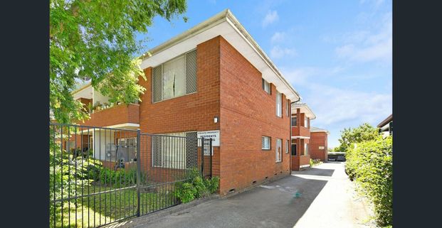 Neat & Convenient Ground Floor Living - Photo 1