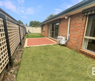 IMMACULATE BRICK HOME WITH SPACE STYLE AND COMFORT - Photo 2