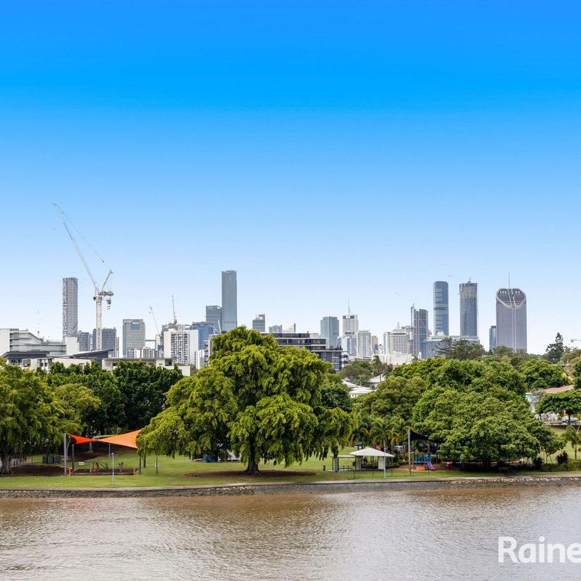 Stunning Riverfront Apartment with Breathtaking Views! - Photo 1