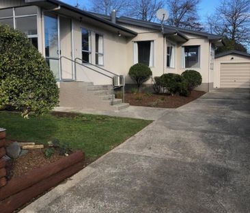 Sunny & Spacious Three-Bedroom Home - Photo 3
