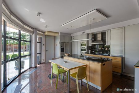 GELIJKVLOERS APPARTEMENT MET TUIN EN TWEE SLAAPKAMERS NABIJ HET STADSCENTRUM VAN BILZEN - Photo 4