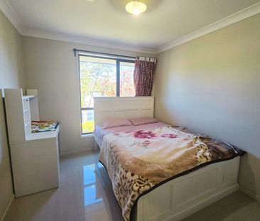 Spacious Four-Bedroom Family Home with Multiple Living Areas!! - Photo 2