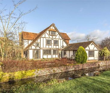 A charming and characterful home set in beautiful gardens with views across open countryside - Photo 6