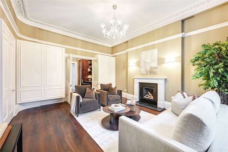 A Masterfully Refurbished Six-Bedroom Townhouse on Cranley Place - Photo 4