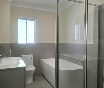NEWLY RNEOVATED 2 BEDROOM UNIT WITH LOCK-UP GARAGE - Photo 3