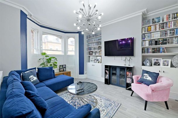 Stylish four bedroom home with modern living across three spacious floors in sought after St. Marks Road. - Photo 1