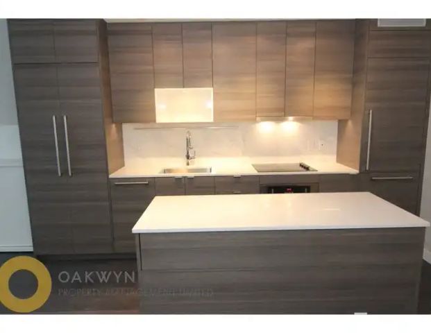 CLOSE TO SKYTRAIN FURNISHED UNIT IN UNIVERISTY DISTRICT BY BOSA | 13398 104 Avenue, Surrey - Photo 1