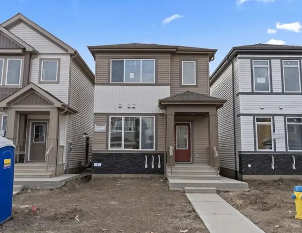 3 bed + Home Office & a Mainfloor full bath. Legal basement suite not included. | 2106 209 Street Northwest, Edmonton - Photo 1