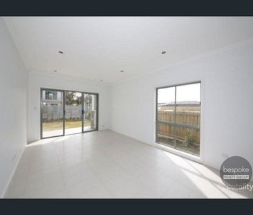 Neat and Spacious Family Home with Multiple Living Areas - Photo 1