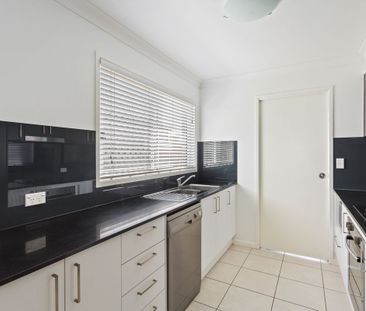 STAND OUT PROPERTY WITH TWO SEPARATE LIVING AREAS! - Photo 5