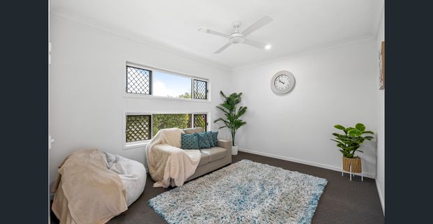 Stylish North-Facing Aura Home with Rare Side Access & Drive-Through Garage - Photo 1