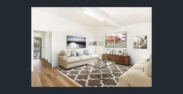 Spacious Three-Bedroom House - Photo 1