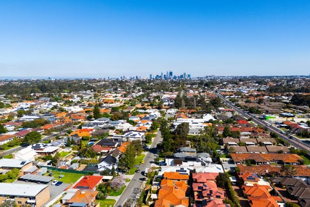 Character Charm Meets Modern Comfort – Your Next Home Awaits - Photo 1