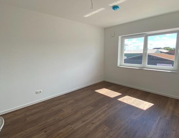 Moderne 2-Zimmer-Wohnung mit großzügigem Wohnbereich & Balkon - Foto 1