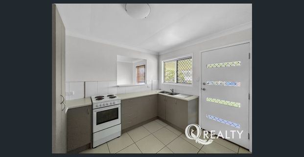 Cozy Family Home in Great Location! - Photo 1