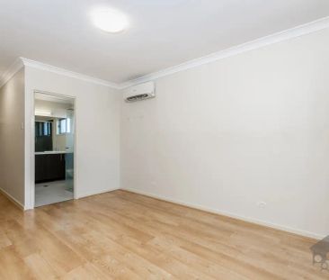 “Spacious Family Home in a Central Location!” - Photo 2