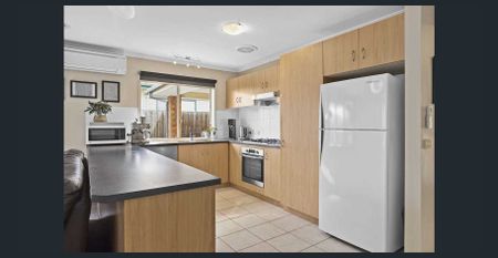 Spacious 4-Bedroom Home with Studio and Enclosed Yard! - Photo 4