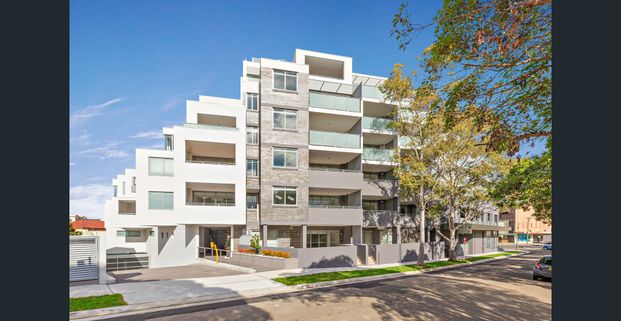 Modern Residence Located In Quiet Tree-Lined Street - Photo 1