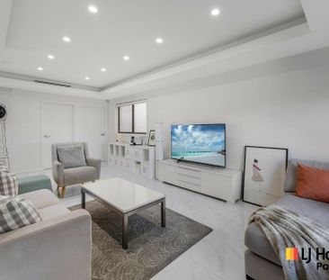 Stylish Four-Bedroom Home in a Prime Location - Photo 1