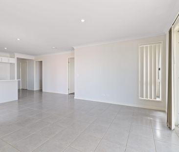 NEAR NEW, LOW MAINTENANCE & SPACIOUS 3 BEDROOM HOME WITH DOUBLE AIR... - Photo 1