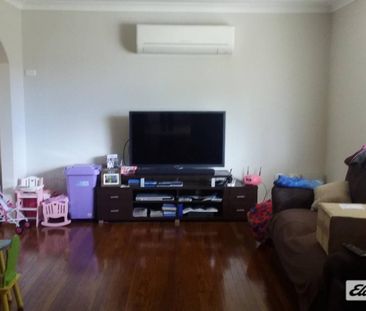 Charming 3 Bedroom Brick Home with Double Garage - Photo 1