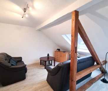 Gemütliche 2 Zimmer Dachgeschosswohnung in ruhiger Lage - Photo 4