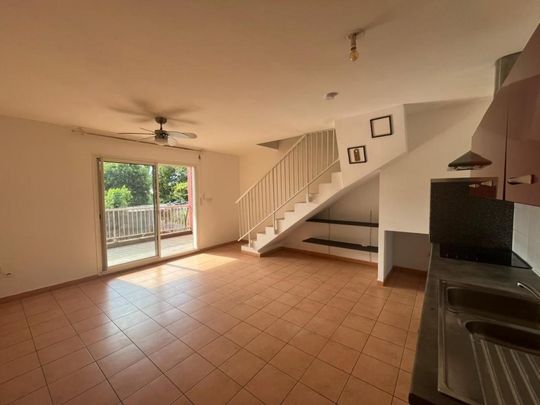 Location Appartement 4 pièces 61m² ST PIERRE 97410 - Photo 1
