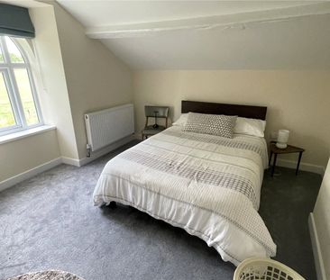 Gwaenynog Lodge is a delightful three-bedroom detached cottage situ... - Photo 3