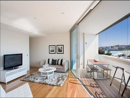 BEACHSIDE LUXURY TWO BEDROOM APARTMENT WITH SENSATIONAL VIEWS! - Photo 5