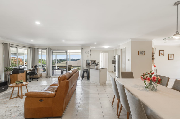 Spacious 4-Bedroom Home with Two Living Areas + Elevated Range Views - Photo 1