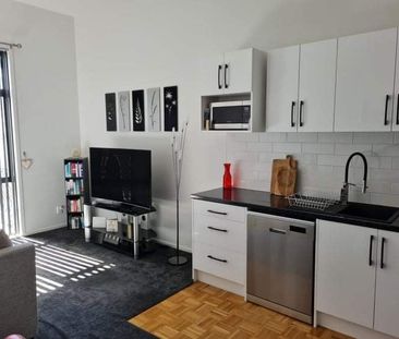 Top-Floor 1-Bedroom Apartment with Balcony - Photo 3