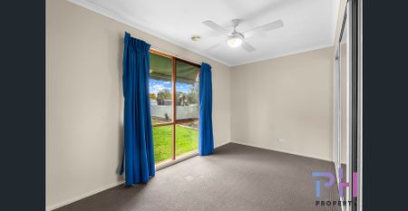 SPACIOUS HOME WITH LARGE BACKYARD AND SHED! - Photo 2