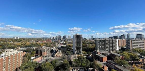 Feels brand new floor to ceiling windows + den! - Photo 2