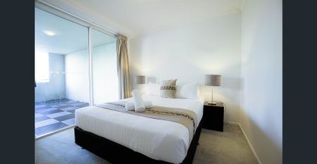 Fully Furnished Two Bedroom One Bathroom Apartments - City Views - Photo 4