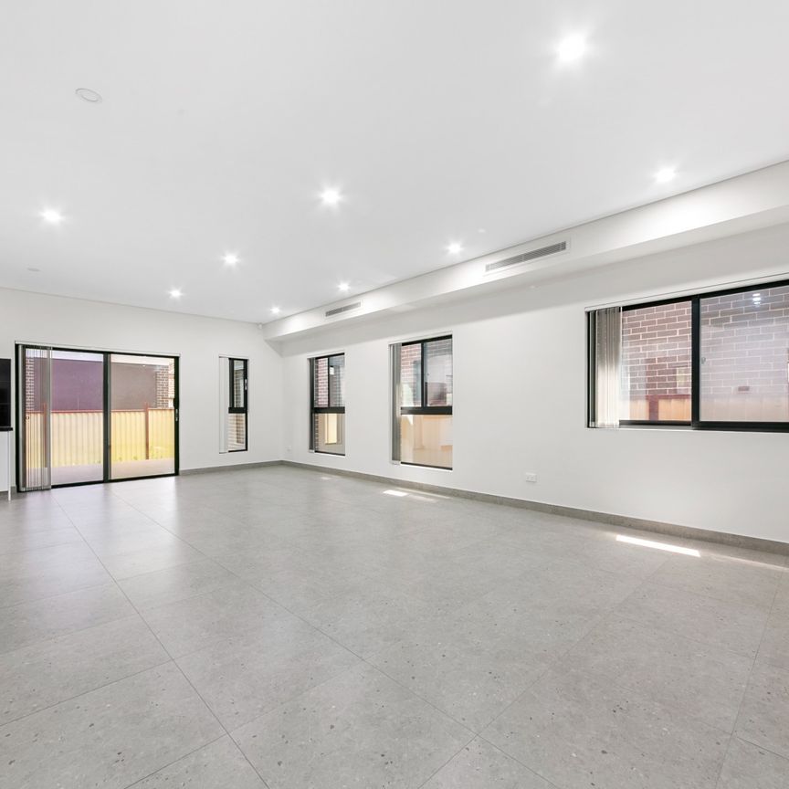 Spacious and Stylish Family Residence for Contemporary Living! - Photo 1