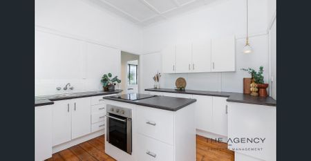 Comfortable 3-Bedroom Home in Convenient Berserker Location - Photo 5