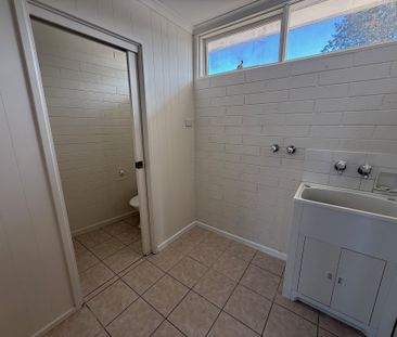 Tucked away in a sought-after beachside locale, this apartment is a... - Photo 2