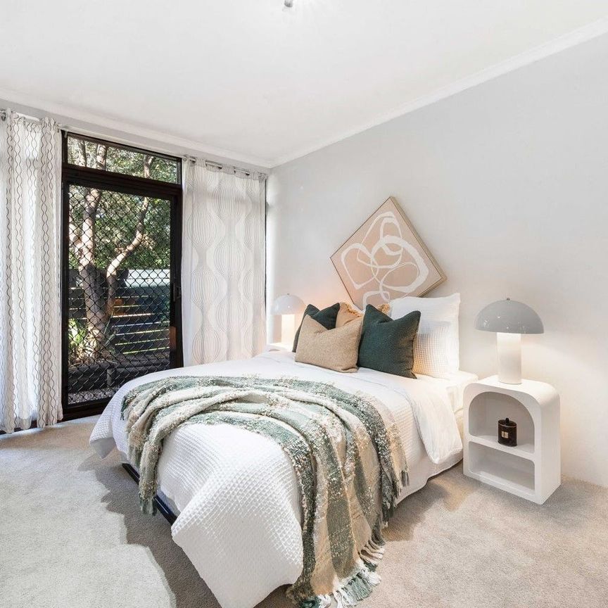 Two bedroom garden unit with villa-like proportions - Photo 1