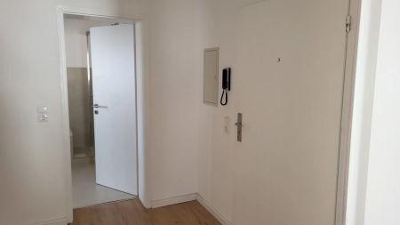 Renovierte 3 Zimmerwohnung mit schicker Einbauküche in zentraler Lage in Welschneudorf! - Photo 2