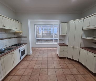 HUGE GROUND LEVEL DUPLEX IN A GREAT LOCATION - Photo 1