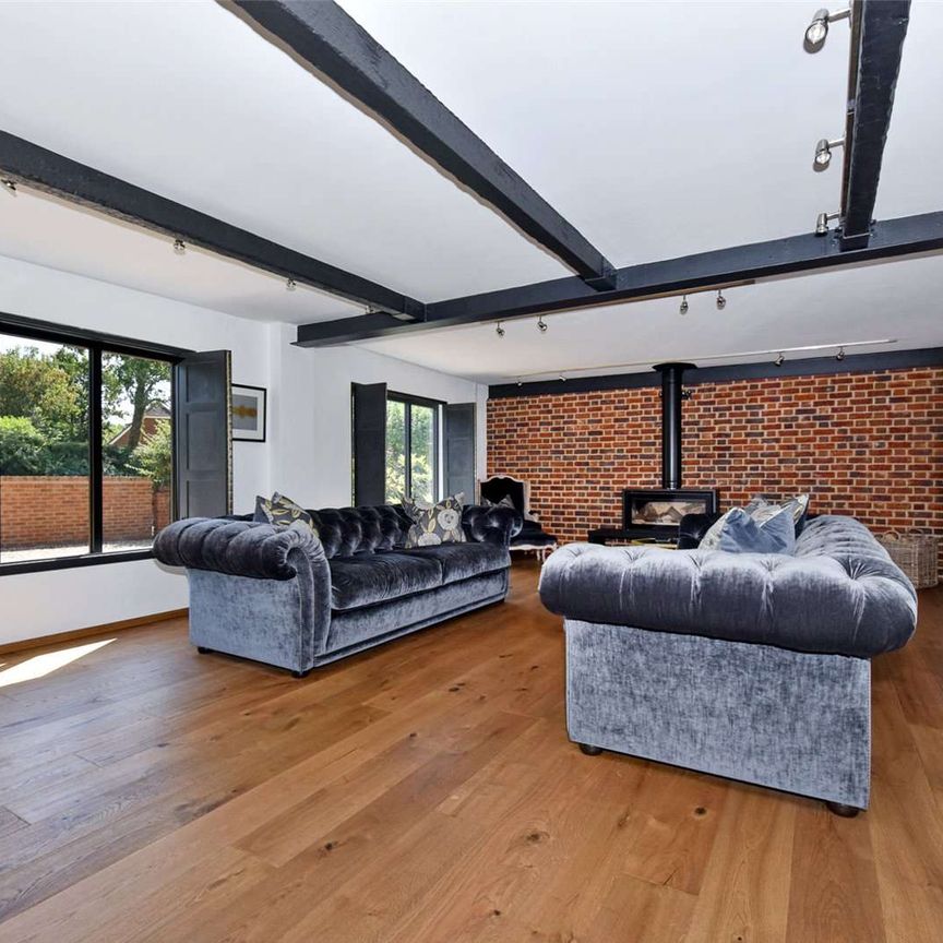 A very high specification and architecturally designed house with large private garden in the sought after village of Maidens Green. - Photo 1