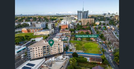 High level, tranquil rear of complex position with lush district views | 250m to Homebush Station - Photo 3