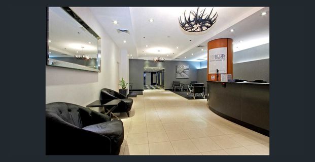 Spacious 2-Bedroom Apartment | Ultimate CBD Convenience - Photo 1