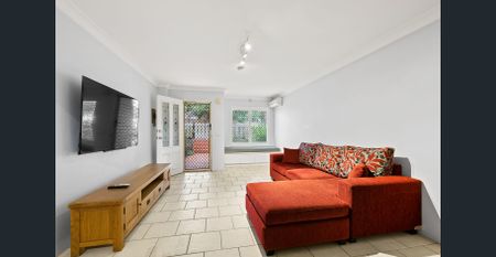 Three-Level Townhouse with Study & Tandem Garage - Discount to Market - Photo 2