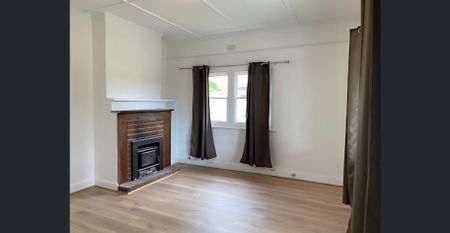 Charming 3-Bedroom Rental Home - Photo 2