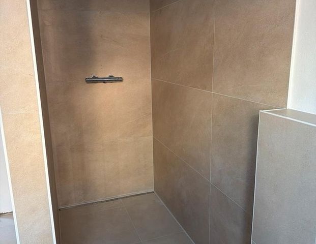 Hochwertige Erstbezug-Obergeschoss-Wohnung im Neubaugebiet - Photo 1