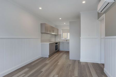 Fully Renovated Coastal Comfort - Stylish Beachside 2 Bedroom Unit with Ocean Views - Photo 5