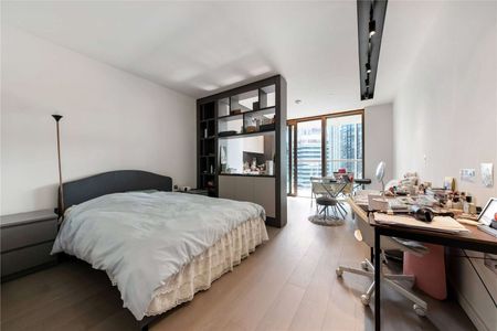 The studio apartment itself boasts an open-plan layout, providing a seamless flow between the living, dining, and sleeping areas. - Photo 3
