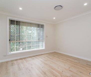 Family Comfort in a Quiet Glenmore Park Cul-de-sac - Photo 1